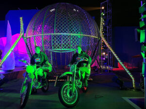 Motorcycle Globe Riders on their Bikes in front of the Cage